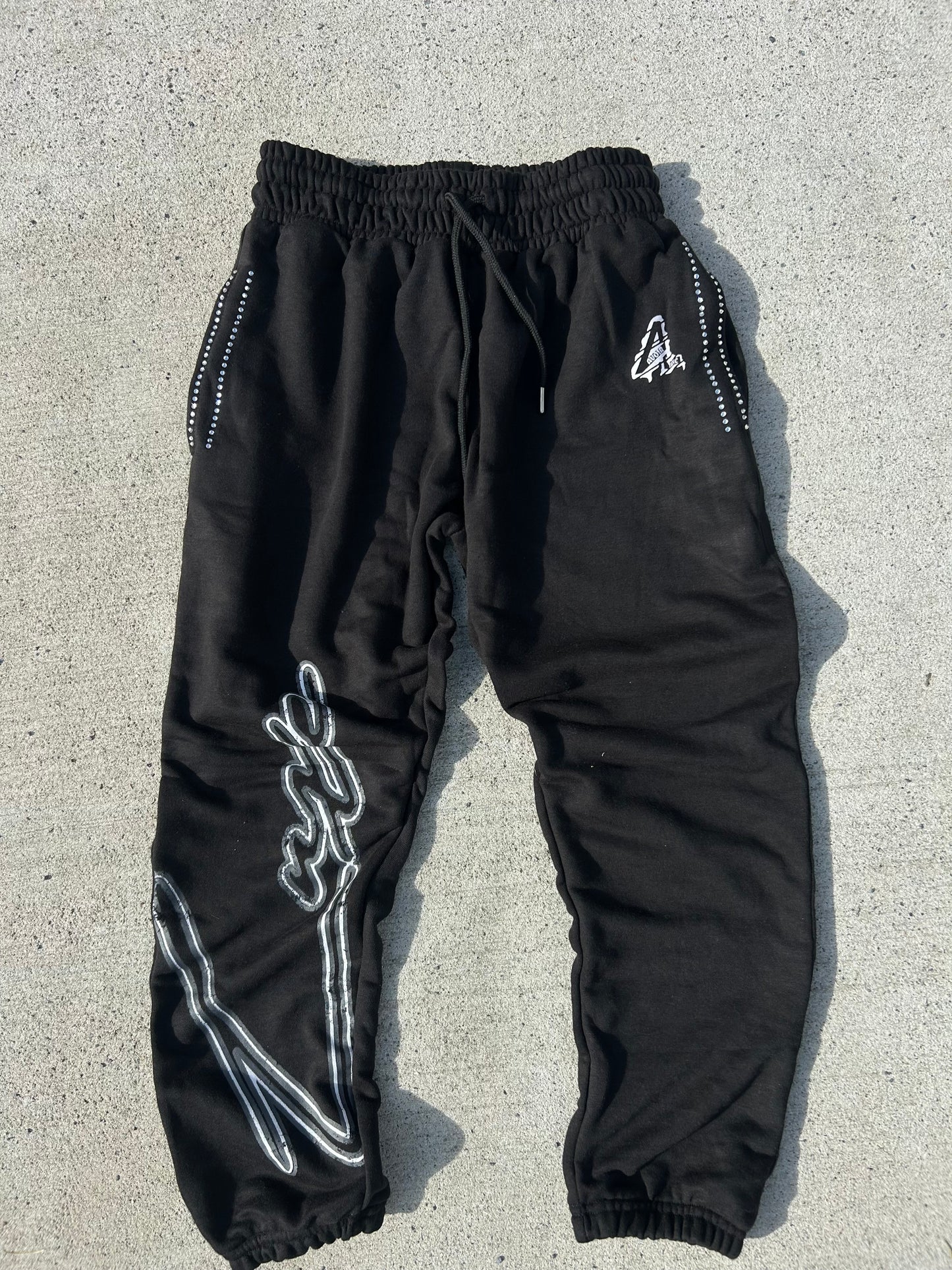 Black “property” sweats