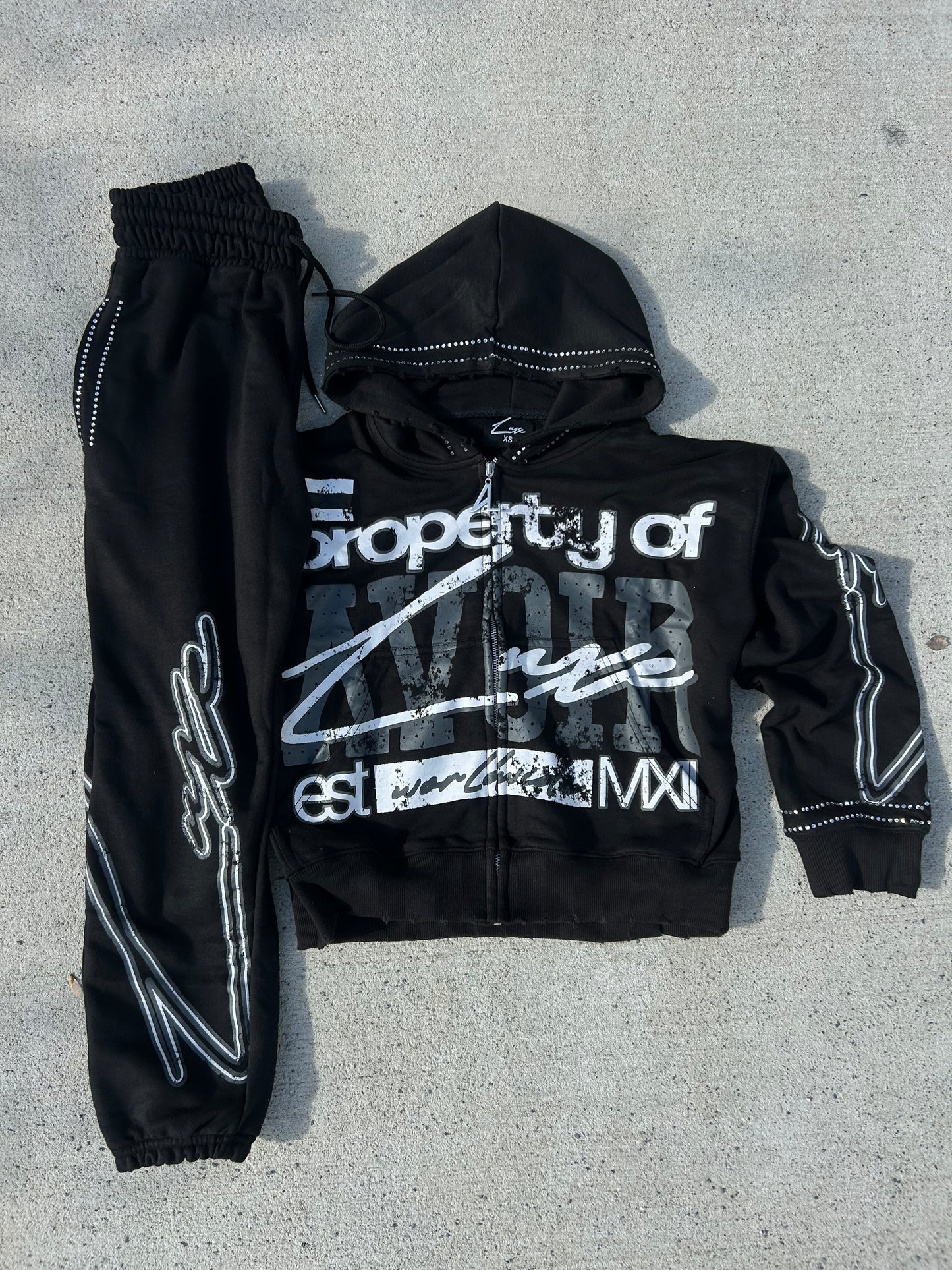 Black/grey “property sweatsuit”